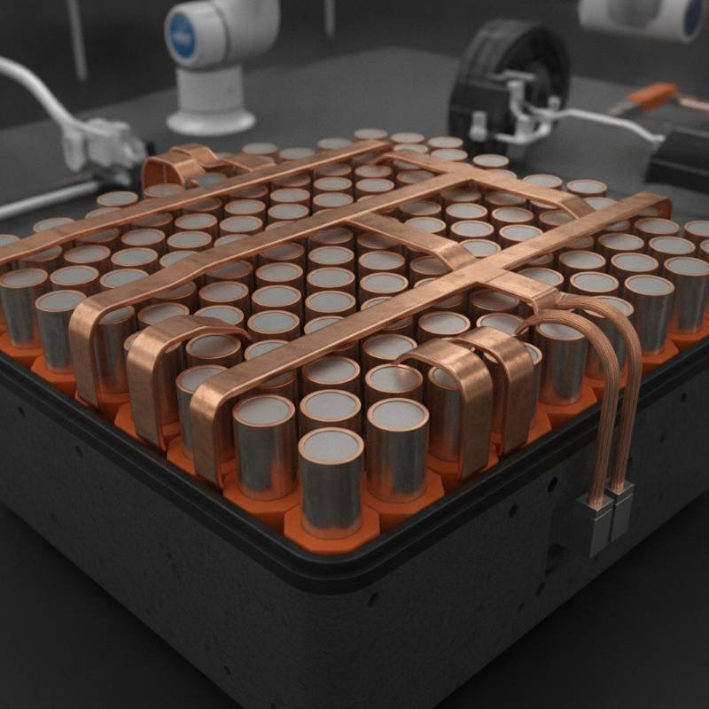 A close up of a custom 21700 battery pack assembly for an electric vehicle with copper busbars.