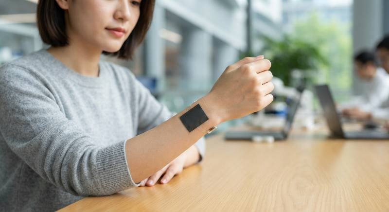 Flexible thin-film medical battery bending on a human wrist